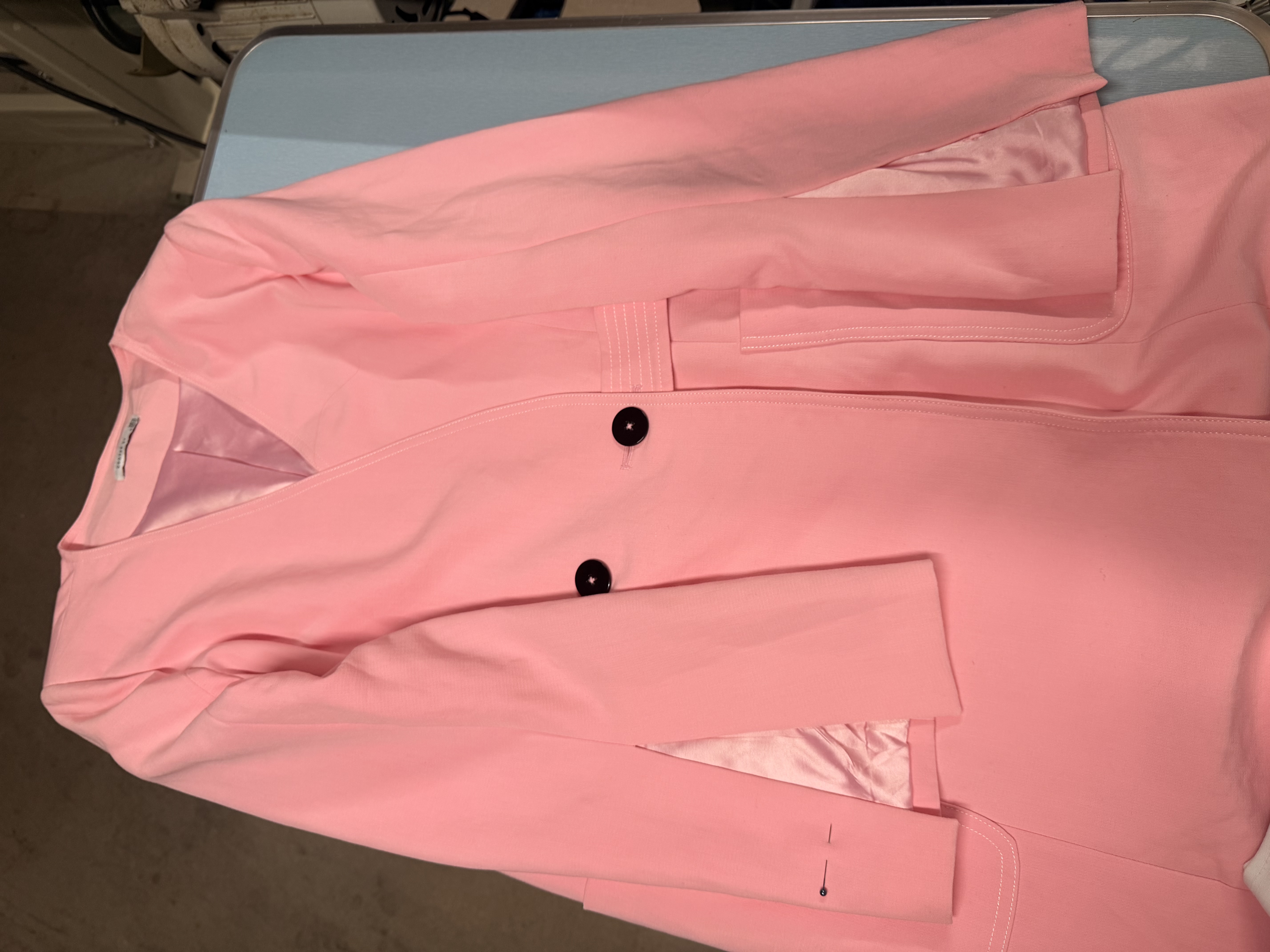 Before — blazer sleeve too long